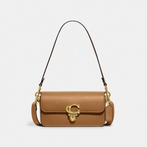 Glovetan Leather/Brass/Light Camel Coach Studio Baguette Bag | COH864842