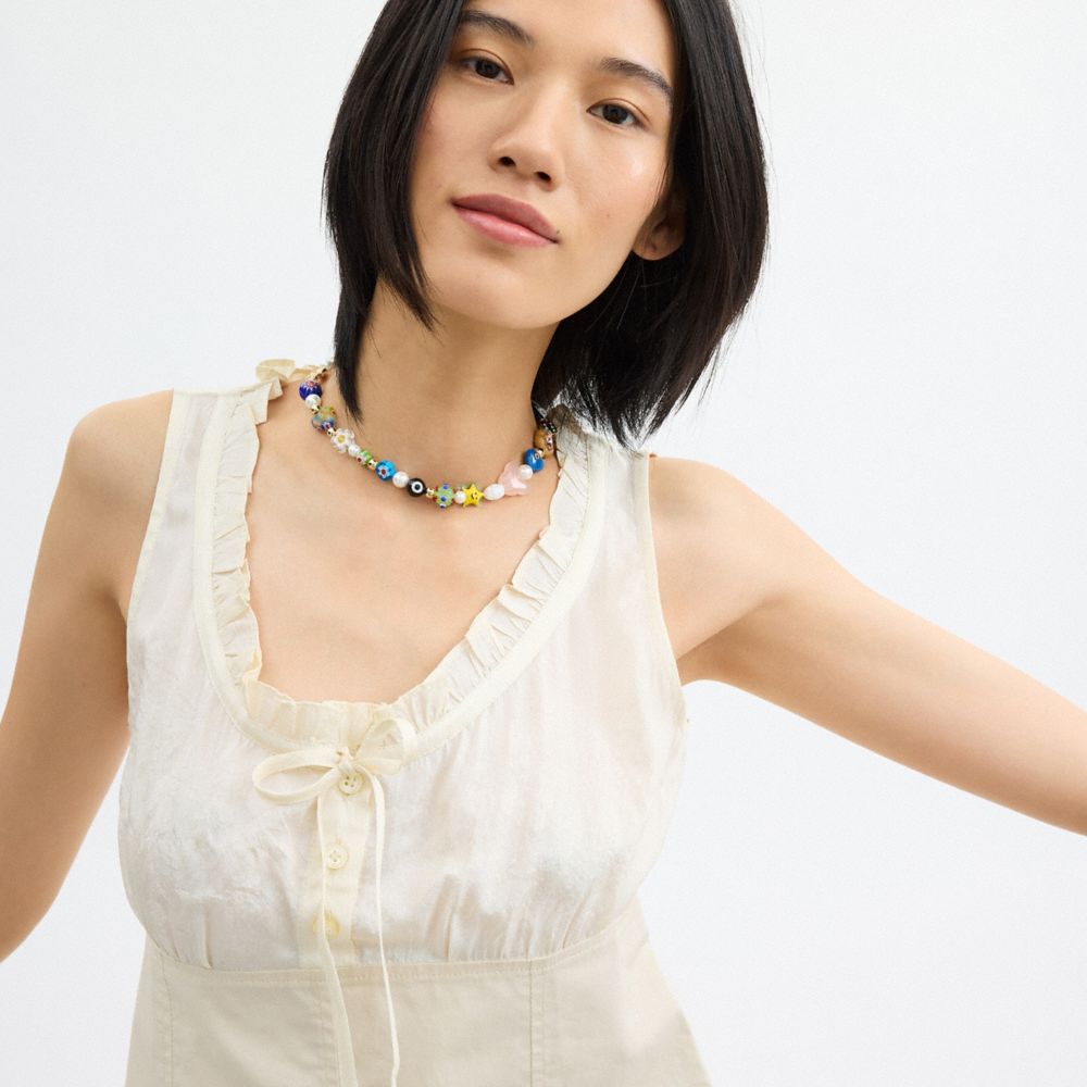 Cream Coach Cargo Top | COH866016