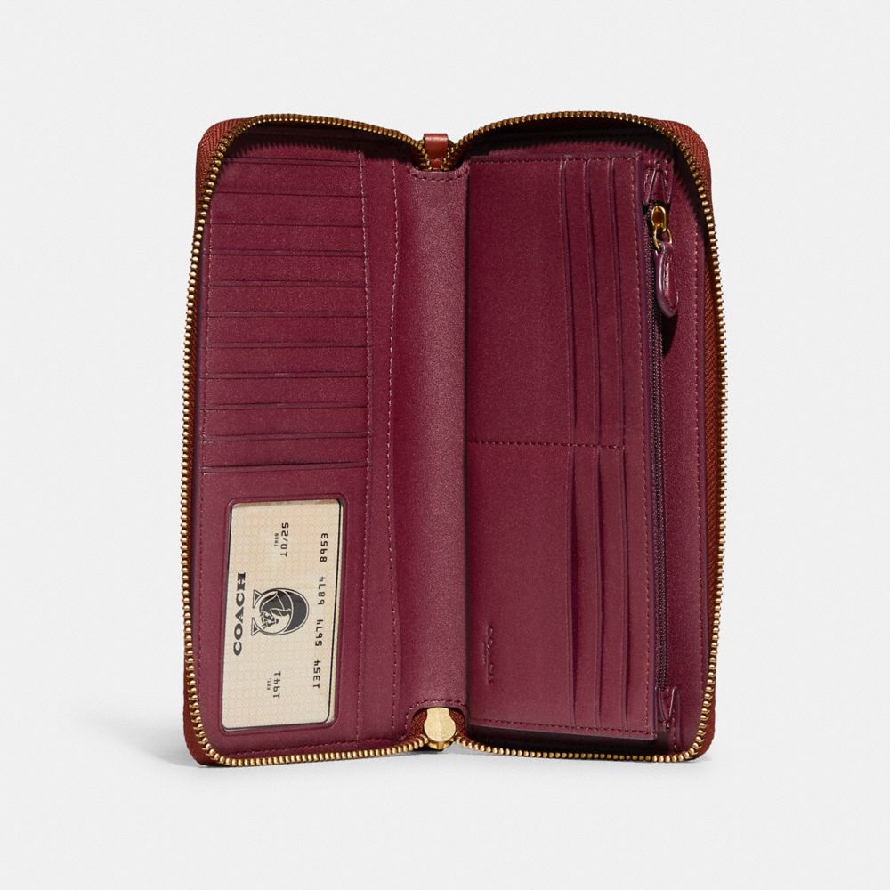 Signature Coated Canvas/Brass/Tan/Rust Coach Continental Wallet In Signature Canvas | COH865514